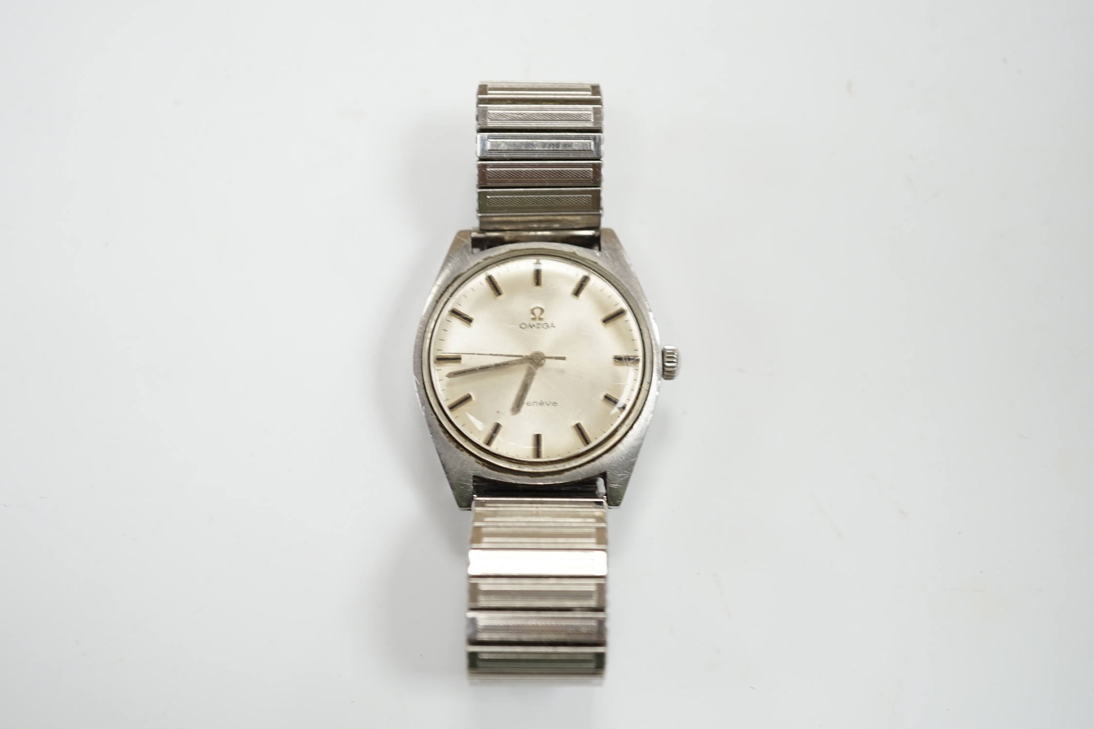 A gentleman's 1970's stainless steel Omega manual wind wrist watch, with baton numerals, cased diameter 36mm, with box and papers.